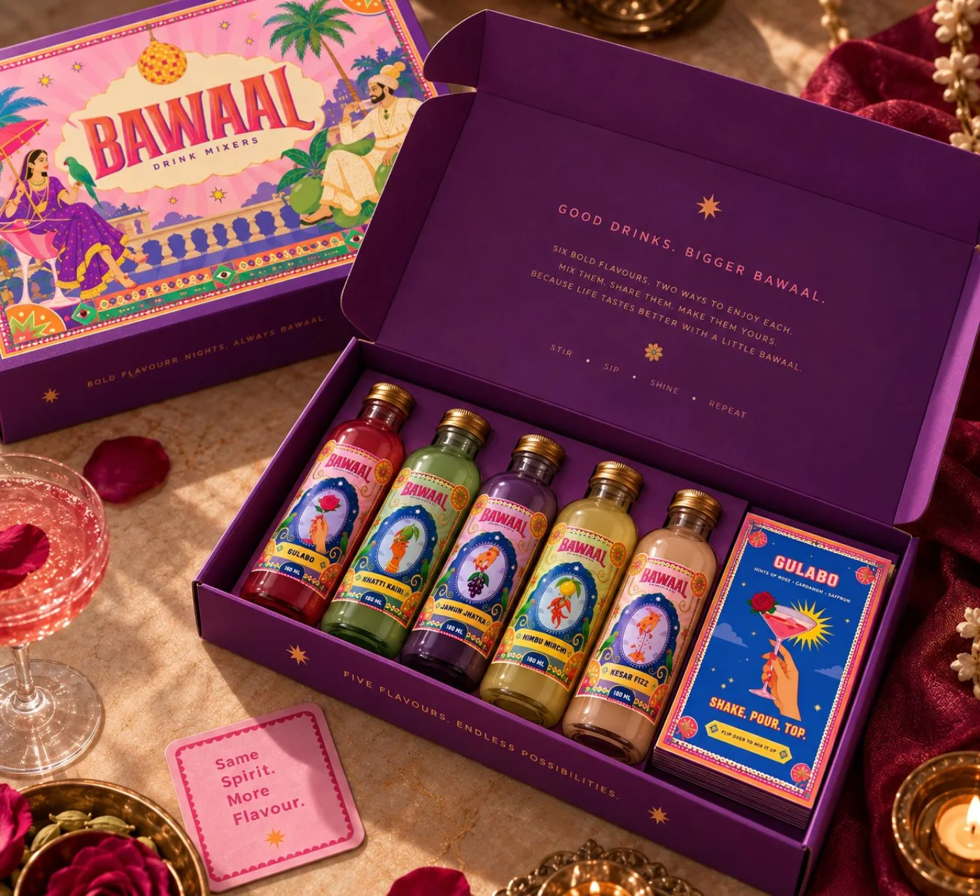 The Bawaal gift box, open, with five bottles and a recipe card